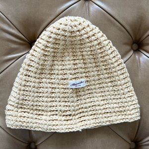 Soft yellow Abercrombie beanie with minor wear. See picture for stain.